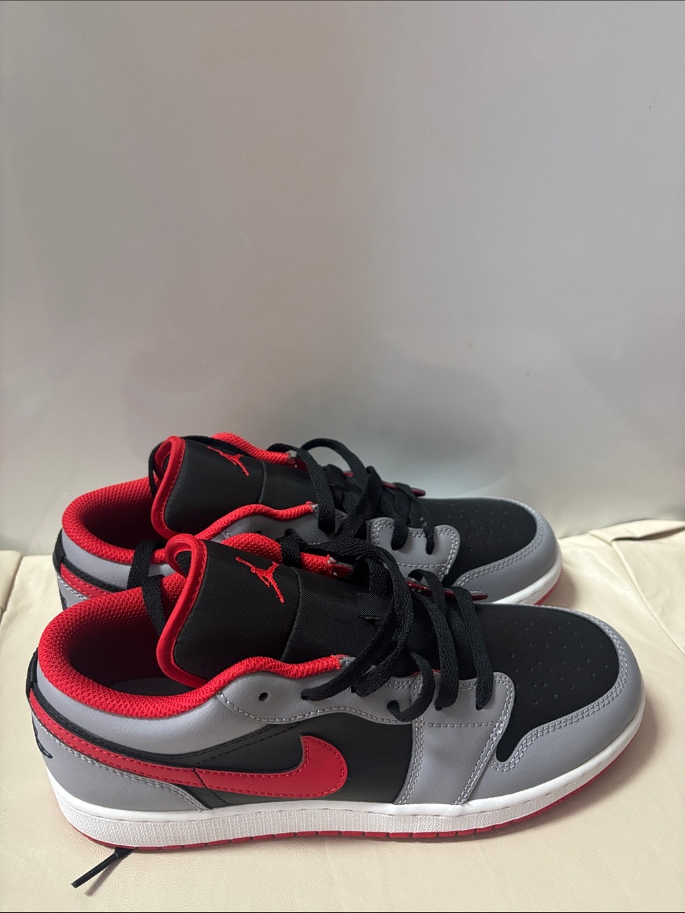 Jordan Low-Top in the black Cement Sneakers in Black, Gray & Red size 7